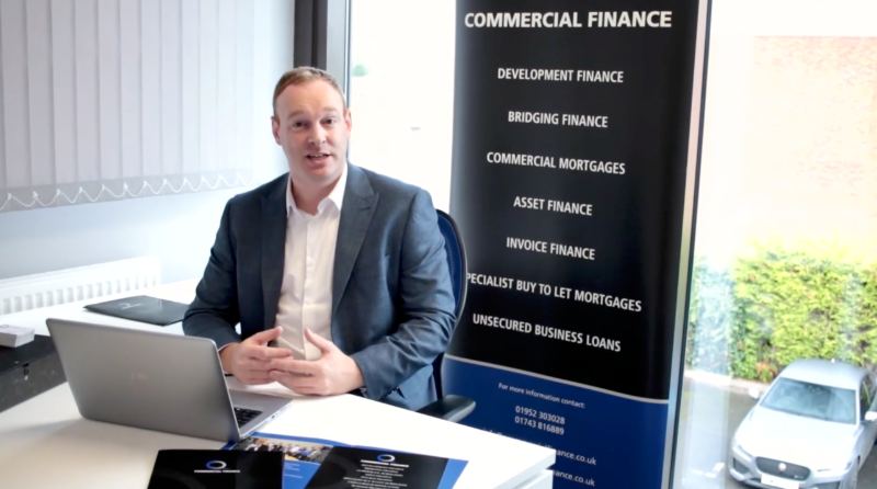 A finance adviser at his desk, from a promotional film we made