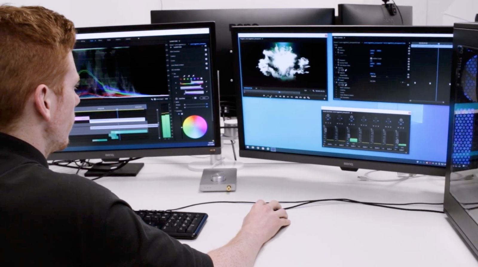 One of our editors grading footage across two screens