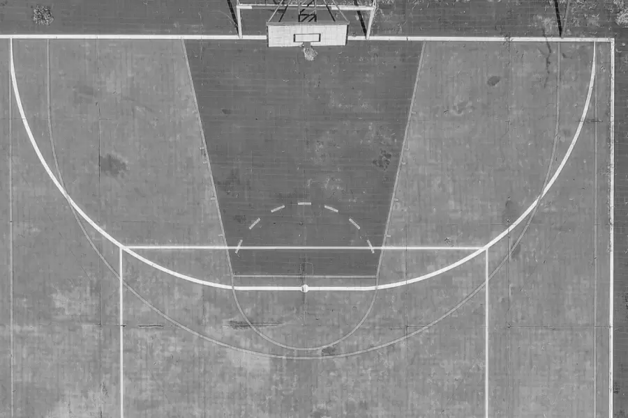 An outdoor basketball court seen from above