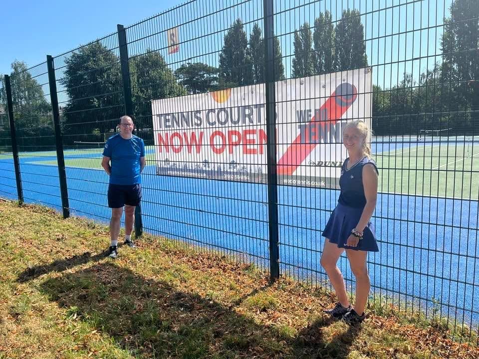 Two coaches outside newly reopened outdoor courts